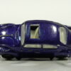 COCHE DE SEGUNDA MANO CON SEÑALES DE USO A ESCALA APROX. 1/64. VISTA TRASERA. VISTA AEREA.