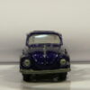 COCHE DE SEGUNDA MANO CON SEÑALES DE USO A ESCALA APROX. 1/64. VISTA TRASERA. VISTA FRONTAL.