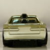 COCHE DE SEGUNDA MANO CON POCAS SEÑALES DE USO A ESCALA APROXIMADA 1/64. VISTA TRASERA.