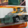 EXCAVADORA NUEVA A ESCALA APROXIMADA 1/64. VISTA FRONTAL.