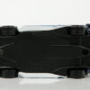 COCHE DE RALLY NUEVO CON SU CAJA A ESCALA APROXIMADA 1/64. VISTA INFERIOR.