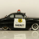 COCHE POLICIA DE LA PELICULA CARS A ESCALA APROXIMADA 1/64.