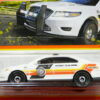 COCHE DE POLICIA NUEVO A ESCALA APROXIMADA 1/64.