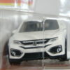 COCHE NUEVO A ESCALA APROXIMADA 1/64. VISTA FRONTAL.