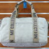 BOLSA DE PIEL SINTETICA APTA PARA VIAJE TAMAÑO PEQUEÑO. VISTA TRASERA.
