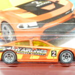 COCHE NUEVO A ESCALA APROXIMADA 1/64.