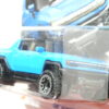 VEHICULO  TODOTERRENO 4X4 PICKUP ELECTRICO NUEVO A ESCALA APROXIMADA 1/64. VISTA FRONTAL.