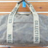 BOLSA DE PIEL SINTETICA APTA PARA VIAJE TAMAÑO MEDIANO.