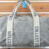 BOLSA DE PIEL SINTETICA APTA PARA VIAJE TAMAÑO MEDIANO. VISTA TRASERA.