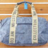 BOLSA DE PIEL SINTETICA APTA PARA VIAJE TAMAÑO PEQUEÑO.