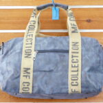 BOLSA DE PIEL SINTETICA APTA PARA VIAJE TAMAÑO PEQUEÑO.
