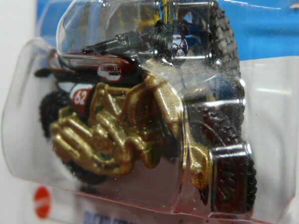 MOTO NUEVA A ESCALA APROXIMADA 1/64. VISTA FRONTAL.