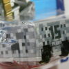 VEHICULO NUEVO A ESCALA APROXIMADA 1/64. VISTA TRASERA.
