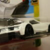 COCHE DEPORTIVO NUEVO A ESCALA APROXIMADA 1/64. VISTA TRASERA.