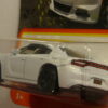 COCHE DEPORTIVO NUEVO A ESCALA APROXIMADA 1/64. VISTA TRASERA.