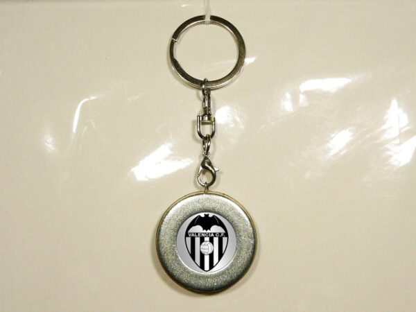LLAVERO DE METAL Y MADERA CON UN DISEÑO ÚNICO Y ORIGINAL. MUY RESISTENTE, ERGONÓMICO, COMPACTO Y DURADERO.