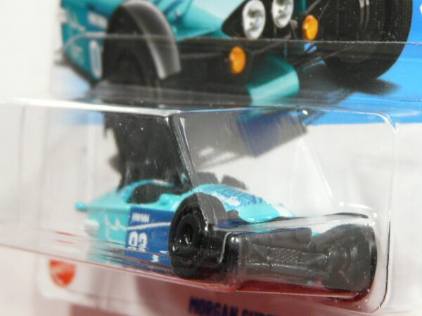 VEHICULO DE TRES RUEDAS NUEVO A ESCALA APROXIMADA 1/64. VISTA FRONTAL.