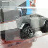 VEHICULO  TODOTERRENO 4X4 ELECTRICO NUEVO A ESCALA APROXIMADA 1/64. VISTA TRASERA.