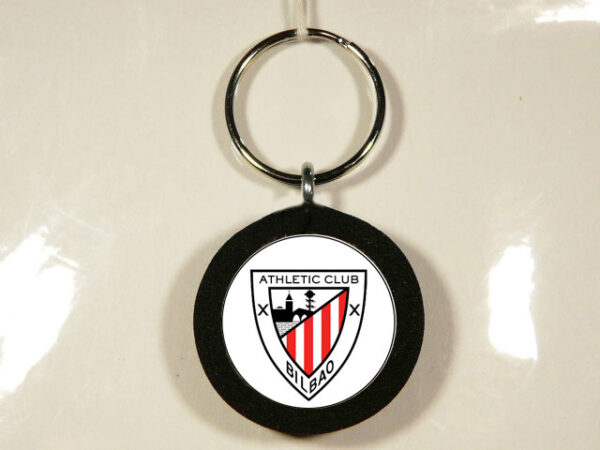 LLAVERO DE MADERA, GOMA Y METAL CON UN DISEÑO ÚNICO Y ORIGINAL.