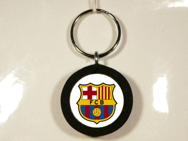 LLAVERO DE MADERA, GOMA Y METAL CON UN DISEÑO ÚNICO Y ORIGINAL.