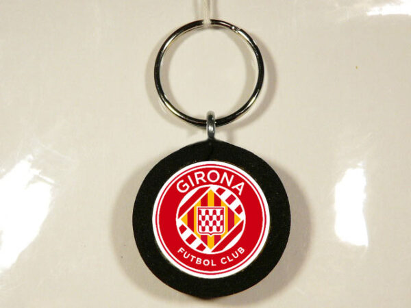 LLAVERO DE MADERA, GOMA Y METAL CON UN DISEÑO ÚNICO Y ORIGINAL.