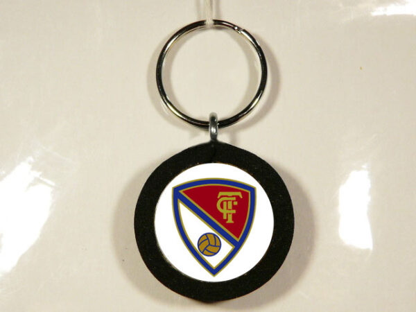 LLAVERO DE MADERA, GOMA Y METAL CON UN DISEÑO ÚNICO Y ORIGINAL.