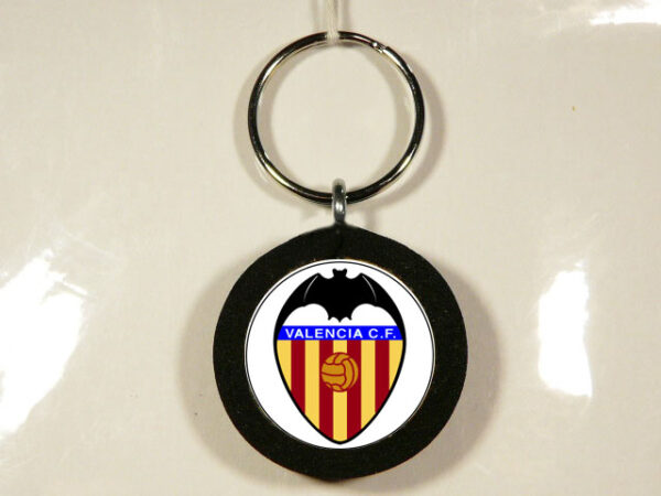 LLAVERO DE MADERA, GOMA Y METAL CON UN DISEÑO ÚNICO Y ORIGINAL.