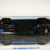 COCHE DEPORTIVO CLASICO NUEVO A ESCALA APROXIMADA 1/64. VISTA INFERIOR.