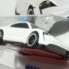 COCHE DEPORTIVO ELECTRICO NUEVO A ESCALA APROXIMADA 1/64. VISTA FRONTAL.
