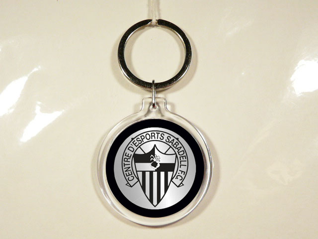 LLAVERO DE PLASTICO Y METAL.