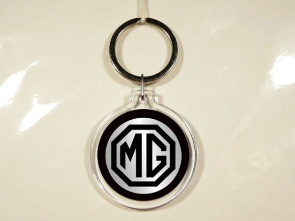 LLAVERO DE PLASTICO Y METAL.