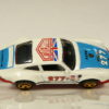 COCHE COUPE CLASICO DE SEGUNDA MANO SIN SEÑALES DE USO Y BUEN ESTADO GENERAL A ESCALA APROXIMADA 1/64. VISTA AEREA.