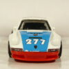 COCHE COUPE CLASICO DE SEGUNDA MANO SIN SEÑALES DE USO Y BUEN ESTADO GENERAL A ESCALA APROXIMADA 1/64. VISTA FRONTAL.