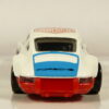COCHE COUPE CLASICO DE SEGUNDA MANO SIN SEÑALES DE USO Y BUEN ESTADO GENERAL A ESCALA APROXIMADA 1/64. VISTA TRASERA.