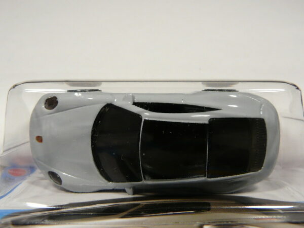 COCHE DEPORTIVO COUPE NUEVO A ESCALA APROXIMADA 1/64. VISTA AEREA.