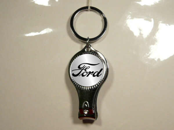 LLAVERO MULTIUSOS DE METAL CON 3 FUNCIONES.