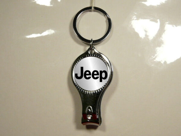 LLAVERO MULTIUSOS DE METAL CON 3 FUNCIONES.