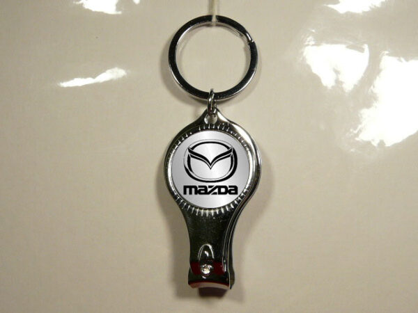 LLAVERO MULTIUSOS DE METAL CON 3 FUNCIONES.