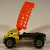 CAMION TODOTERRENO 4X4 NUEVO EN MINIATURA, SIN BLISTER. ESCALA APROXIMADA 1/64. VISTA CON JAULA ABIERTA.