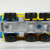 CAMION VOLQUETE TODOTERRENO NUEVO EN MINIATURA, SIN BLISTER. ESCALA APROXIMADA 1/64. VISTA INFERIOR.
