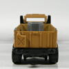 CAMION TODOTERRENO 4X4 EN MINIATURA, SIN SEÑALES DE USO Y BUEN ESTADO GENERAL VISTA TRASERA.