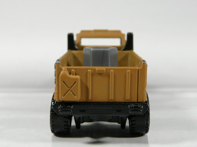 CAMION TODOTERRENO 4X4 EN MINIATURA, SIN SEÑALES DE USO Y BUEN ESTADO GENERAL VISTA TRASERA.