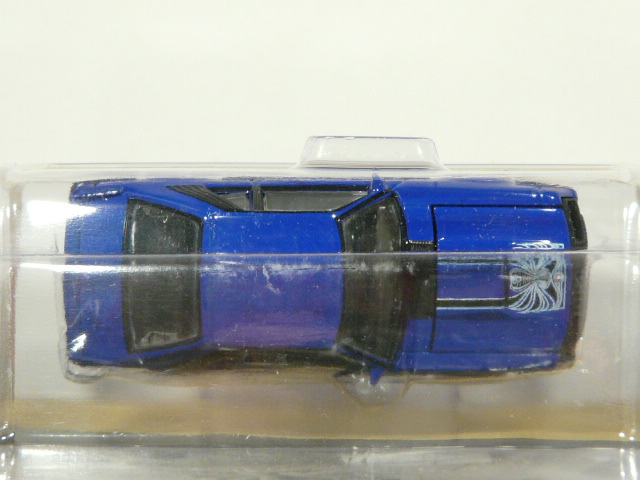 PARA MAYORES DE 14 AÑOS. COUPÉ NUEVO EN MINIATURA A ESCALA APROXIMADA 1/64 DE LA SERIE LIMITADA EXCLUSIVE HOBBY. VISTA AEREA.