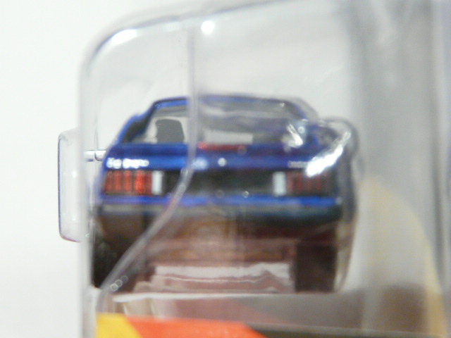 PARA MAYORES DE 14 AÑOS. COUPÉ NUEVO EN MINIATURA A ESCALA APROXIMADA 1/64 DE LA SERIE LIMITADA EXCLUSIVE HOBBY. VISTA TRASERA.