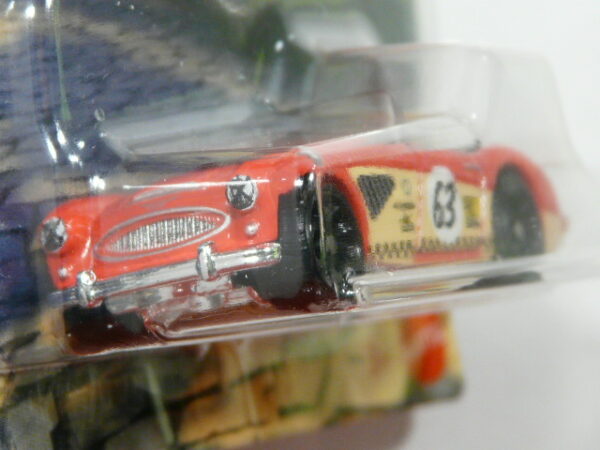 COCHE CLÁSICO DEPORTIVO DESCAPOTABLE NUEVO EN MINIATURA A ESCALA APROXIMADA 1/64. VISTA FRONTAL.