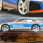 COCHE PATRULLA NUEVO EN MINIATURA A ESCALA APROXIMADA 1/64.