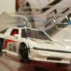 COCHE CLÁSICO DEPORTIVO COUPE NUEVO EN MINIATURA A ESCALA APROXIMADA 1/64. VISTA FRONTAL.
