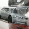 COCHE CLASICO NUEVO EN MINIATURA A ESCALA APROXIMADA 1/64. VISTA FRONTAL.