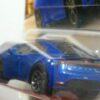 COCHE HÍBRIDO NUEVO EN MINIATURA A ESCALA APROXIMADA 1/64. VISTA TRASERA.